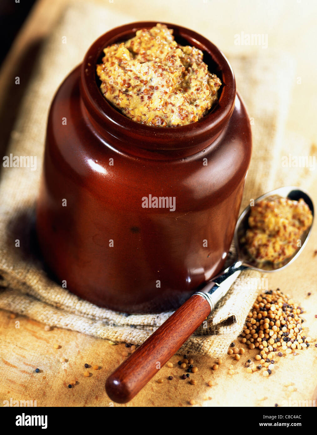 pot of traditional grain mustard Stock Photo Alamy