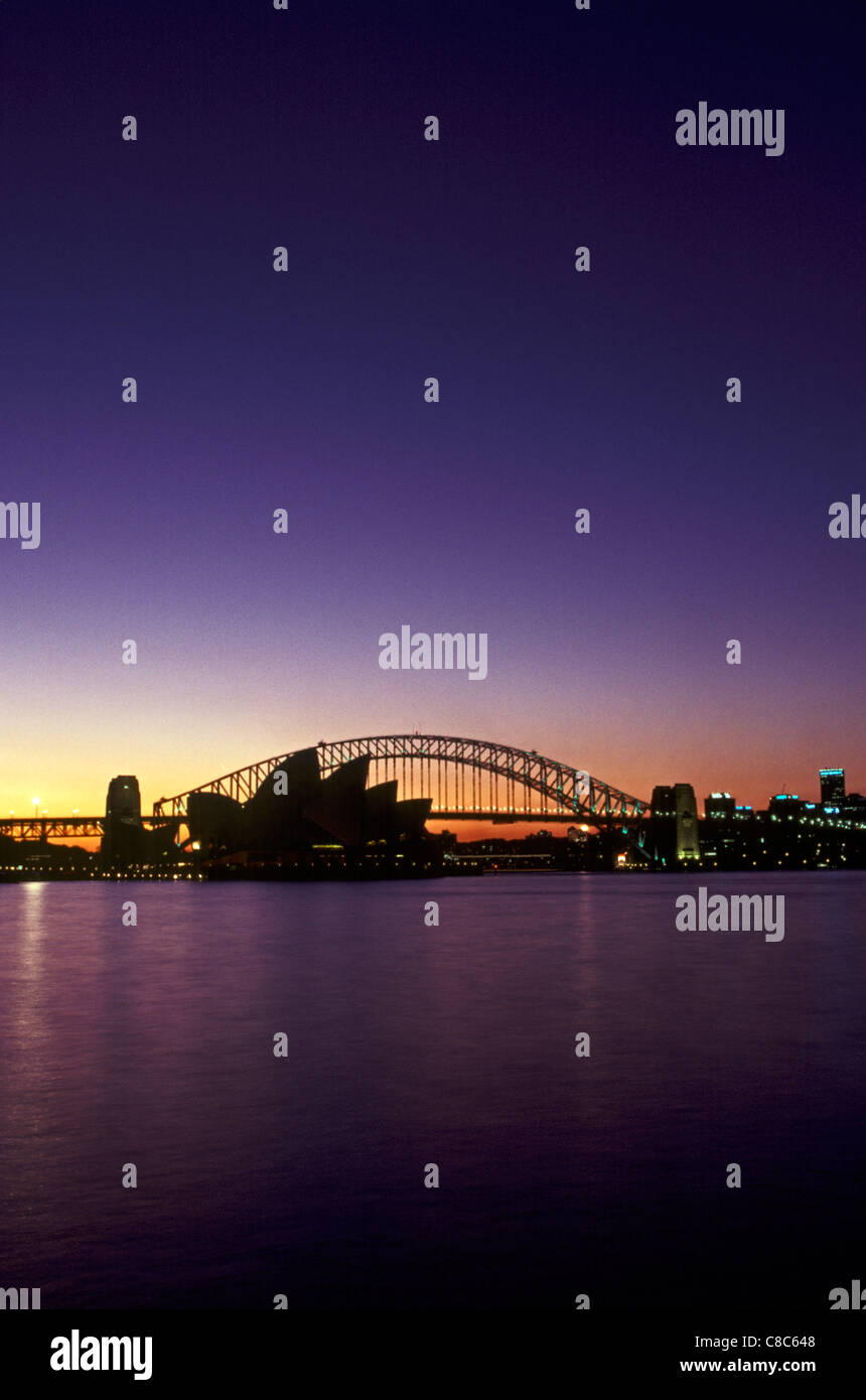 Sydney Harbour Bridge and Opera House at sunset, Australia Stock Photo ...