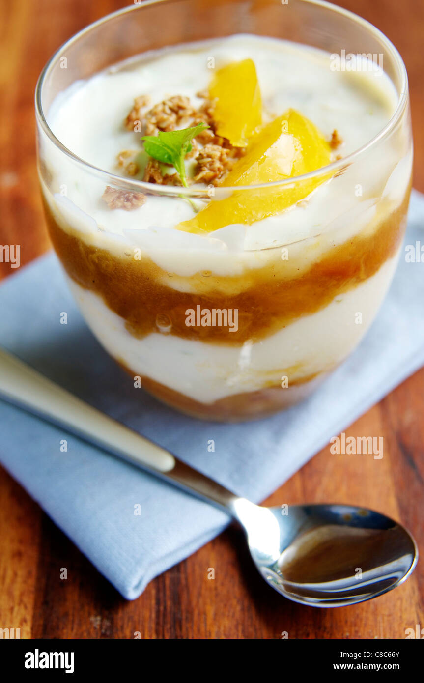 Yellow Plum Compote and Lime Soy Yogurt Parfait. Stock Photo