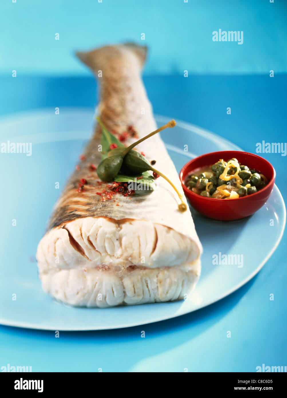 hake with capers Stock Photo Alamy