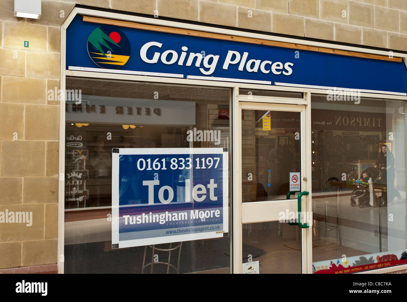 GOING PLACES travel agency shop TO LET Stock Photo
