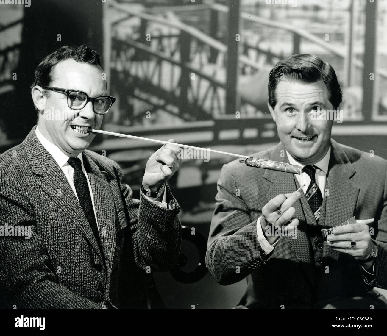 MORECAMBE AND WISE English comedians Eric Morecambe at left and Ernie Wise about 1962 Stock Photo