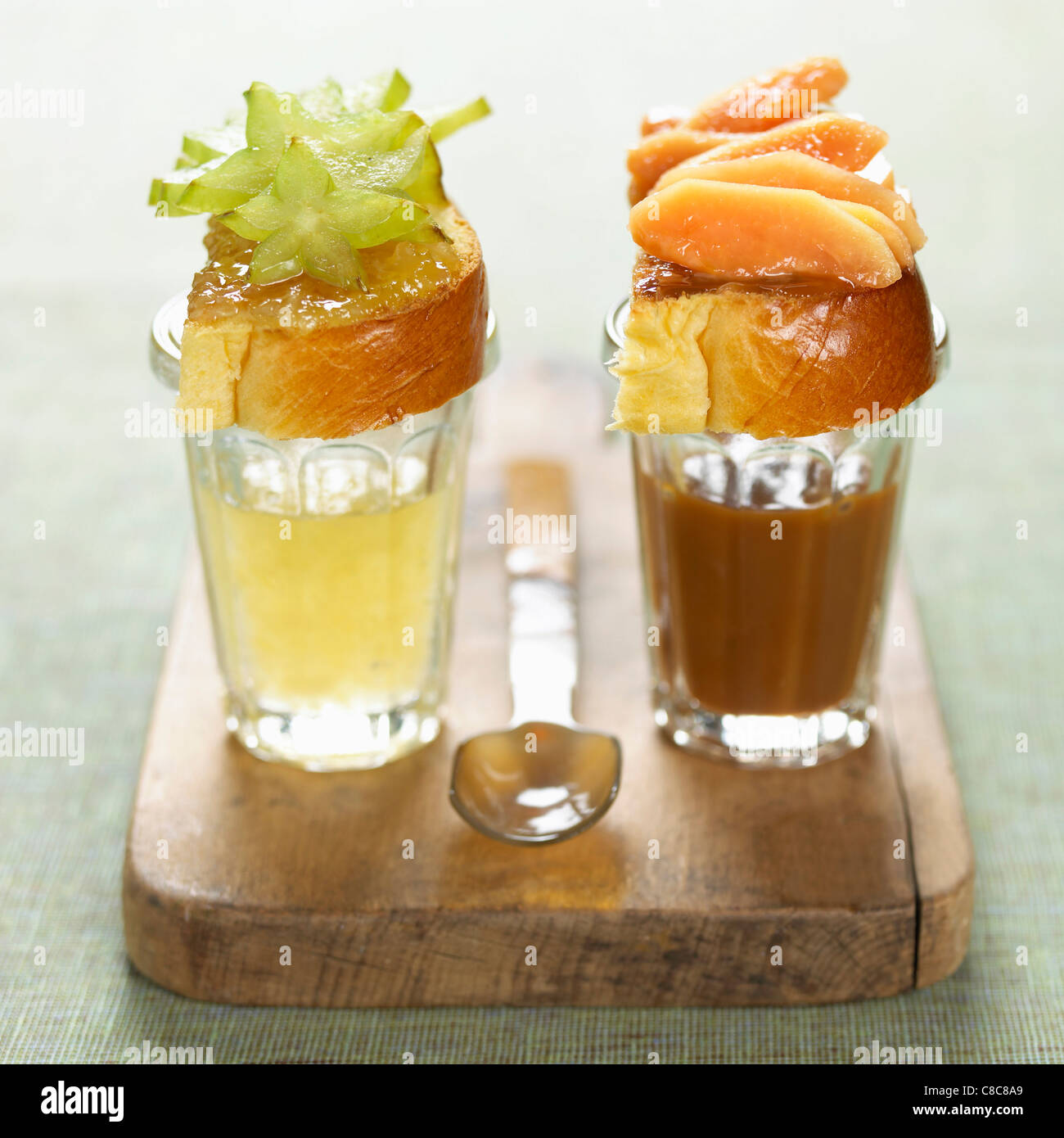 jam and exotic fruit open sandwiches Stock Photo Alamy