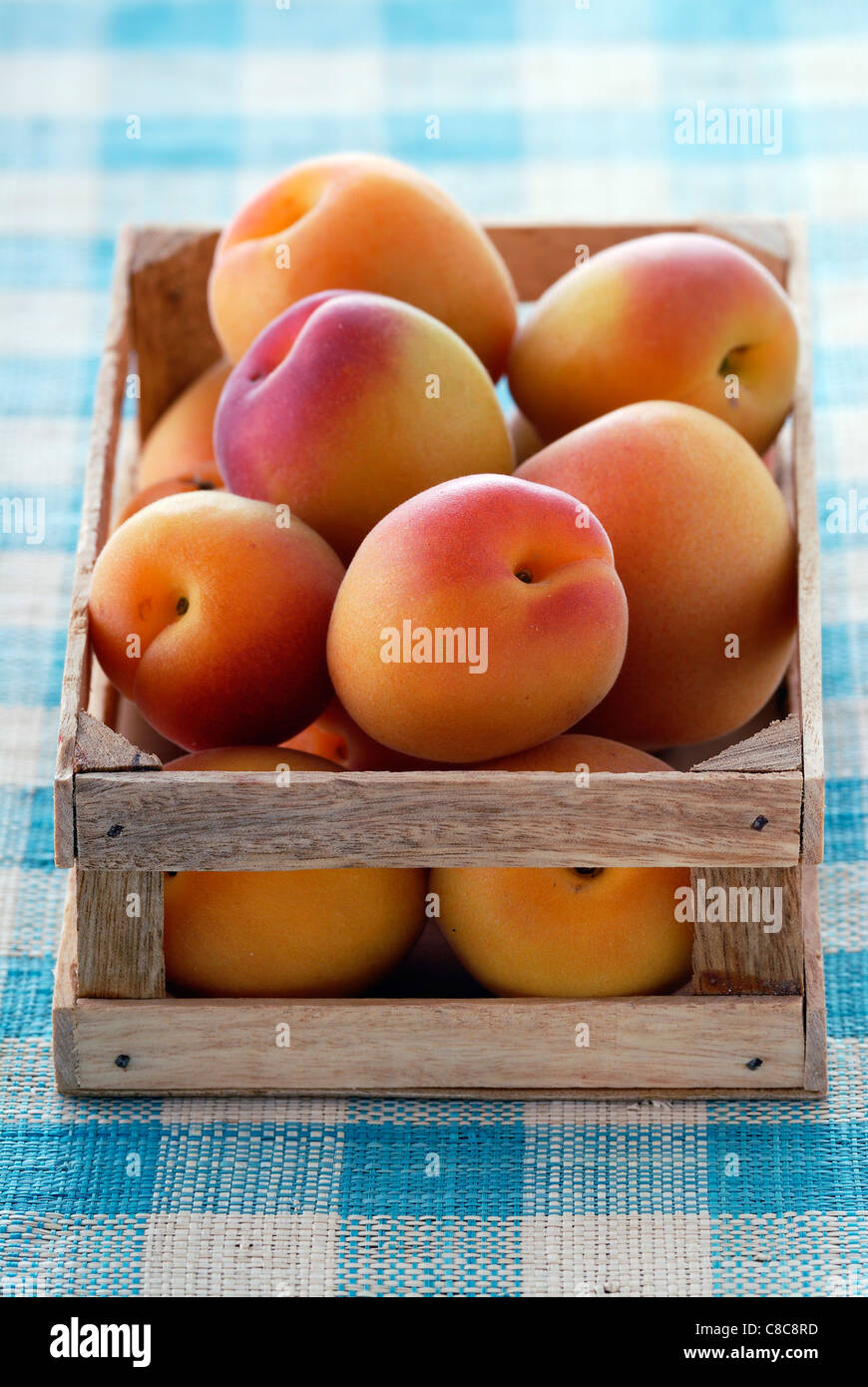 Small box of apricots Stock Photo