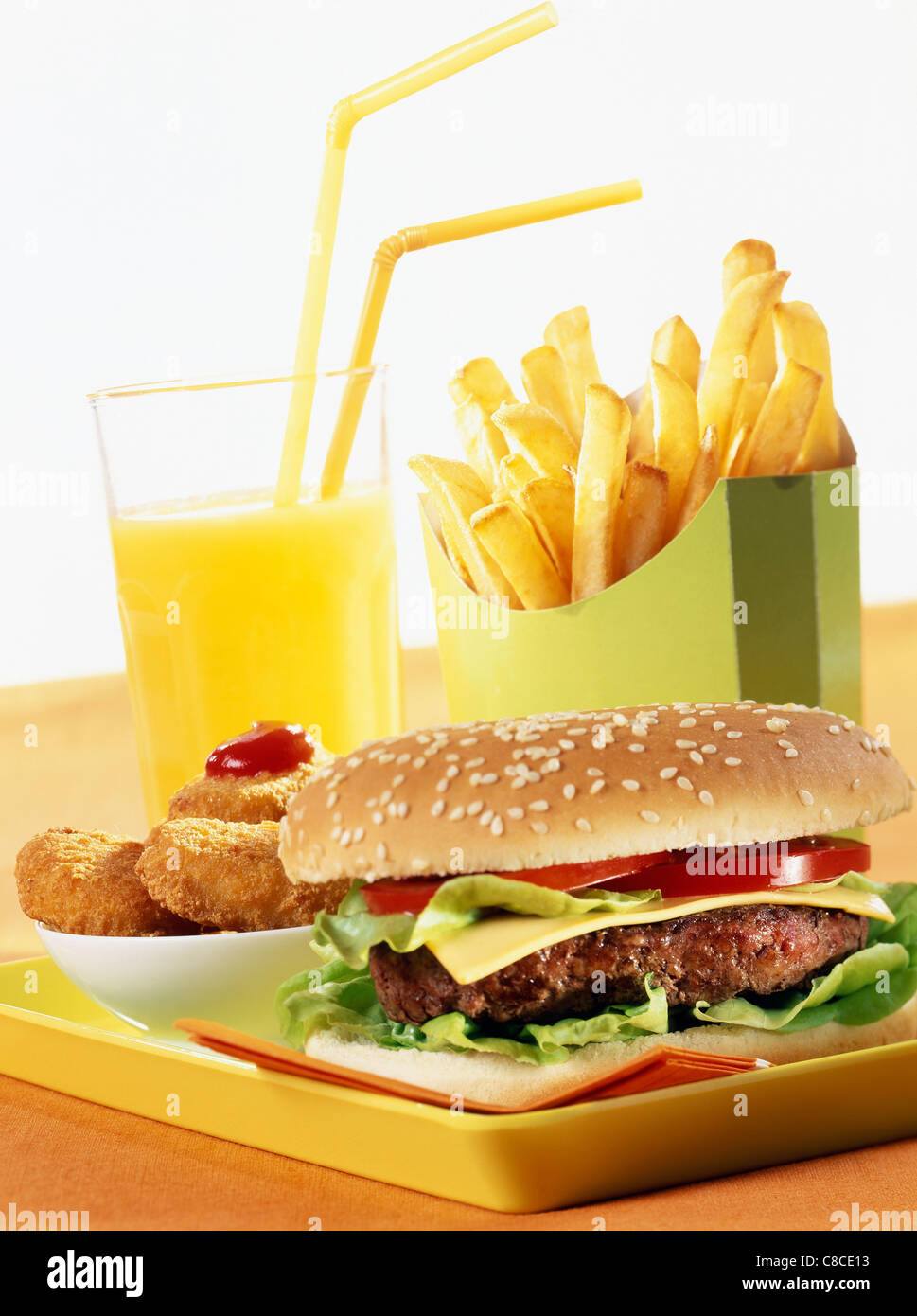 Hamburger,nuggets,french fries and orange juice Stock Photo - Alamy