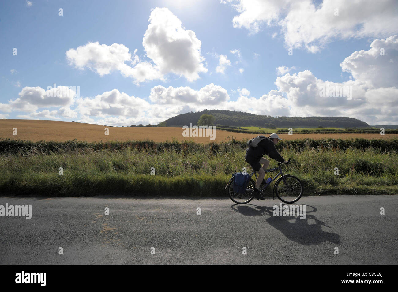 © Tony Bartholomew A cyclist makes his way out of Scarborough near the village of scalby. Stock Photo