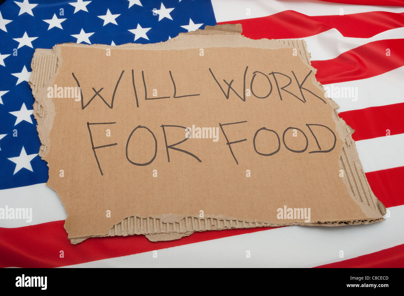 Unemployment in USA Sign Will Work For Food on Cardboard on American Flag Stock Photo Alamy
