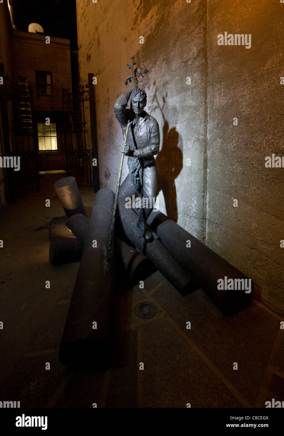 Lumberjack statue in Quebec City during night Stock Photo