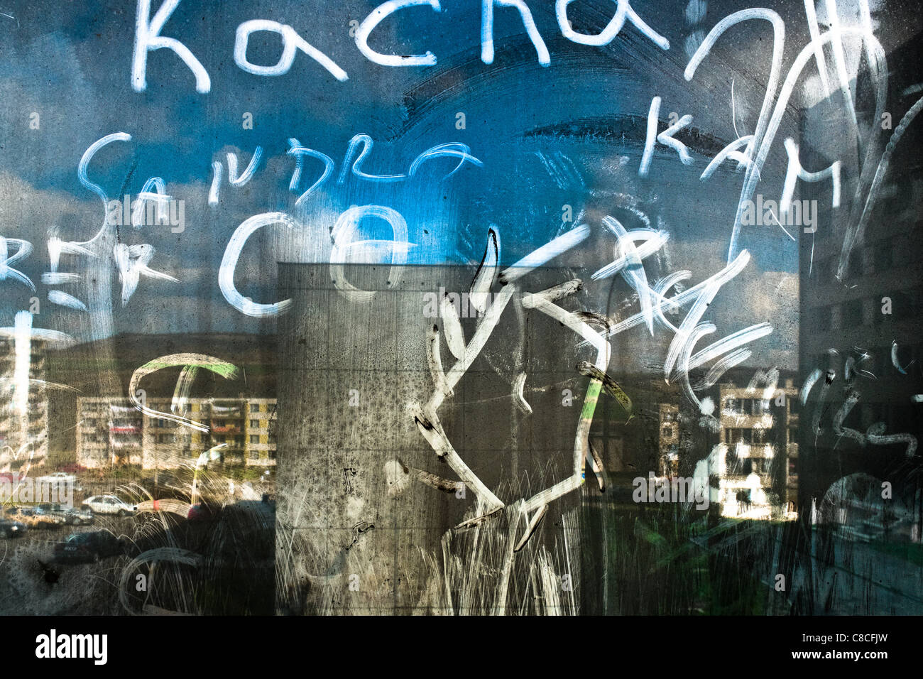 The Gipsy ghetto of Chanov seen through a dirty window in a devastated ...