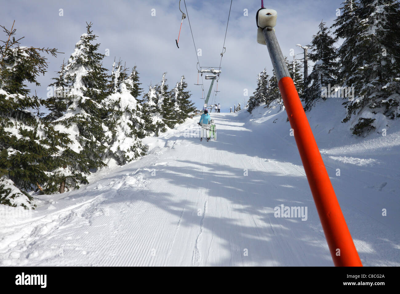Czech mountains Krkonose in winter - people on ski tow Stock Photo