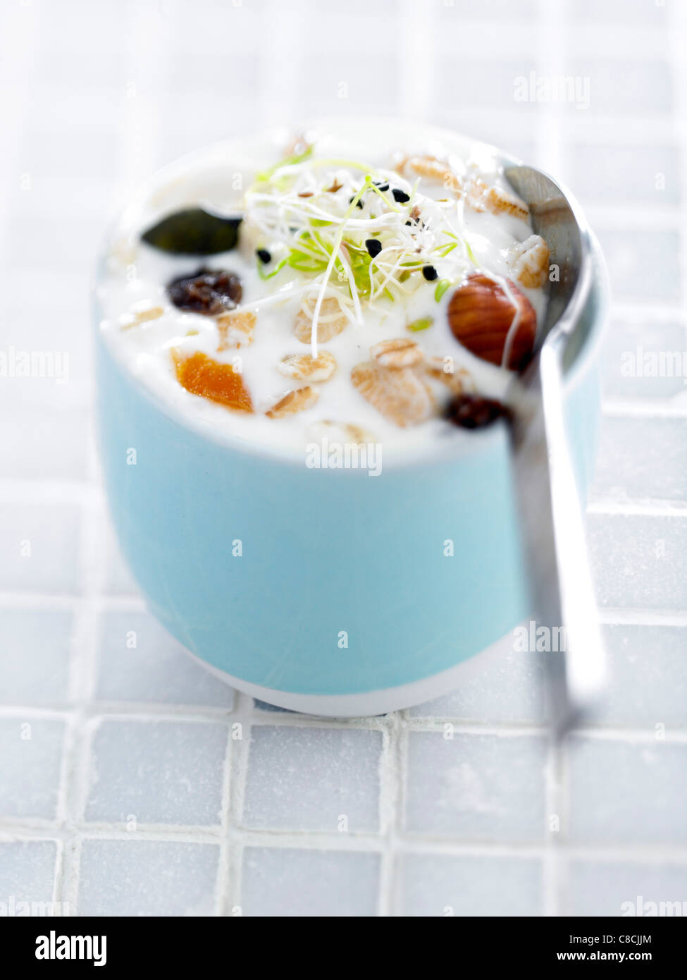 Creamy meusli with baby shoots Stock Photo