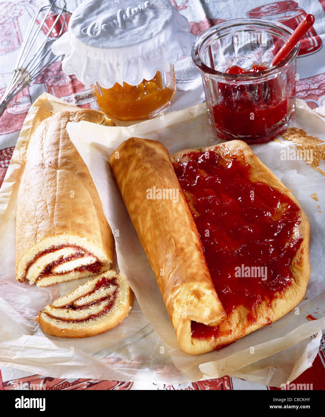 Biscuit and jam Swiss roll Stock Photo Alamy