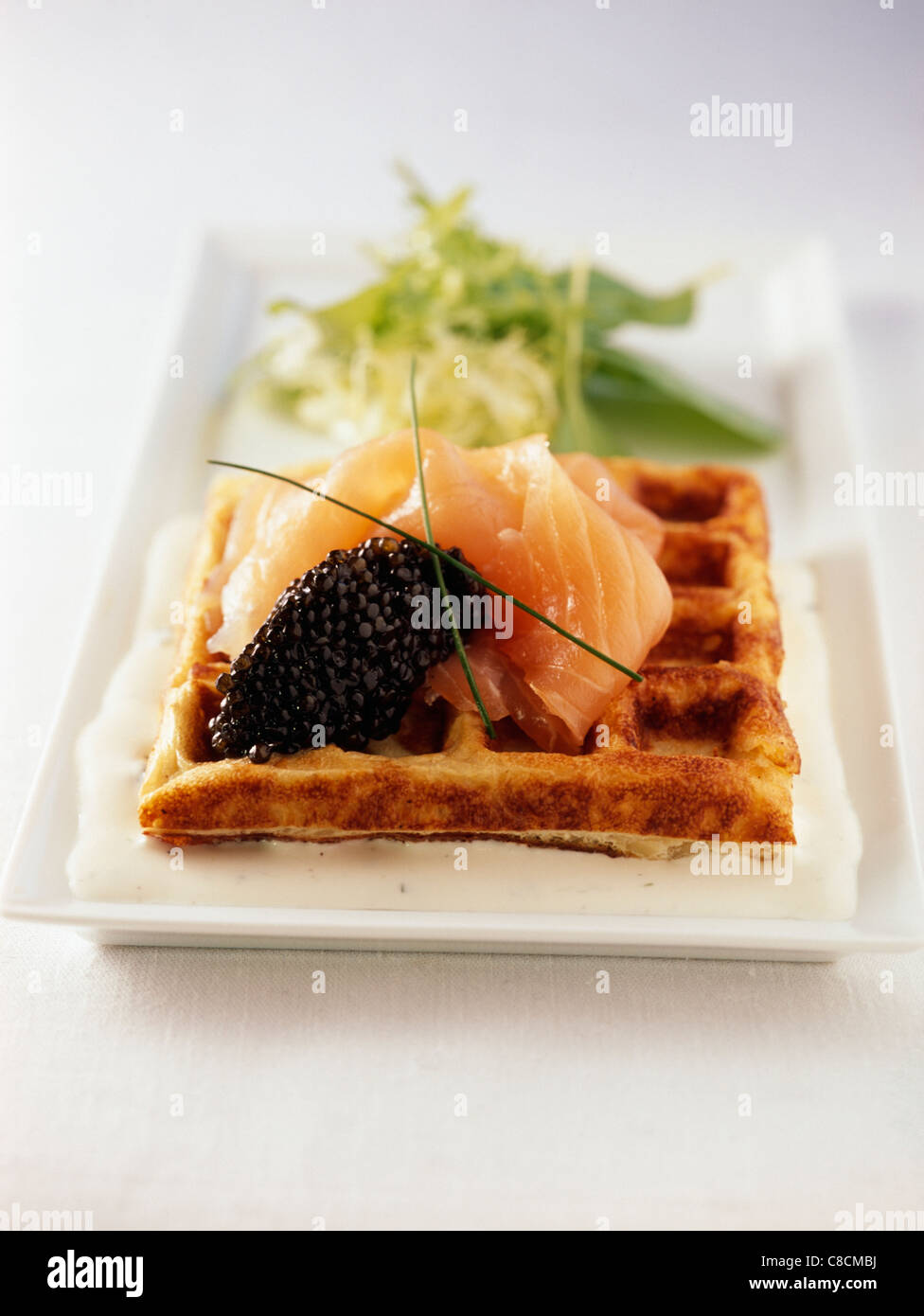 Waffle with caviar Stock Photo