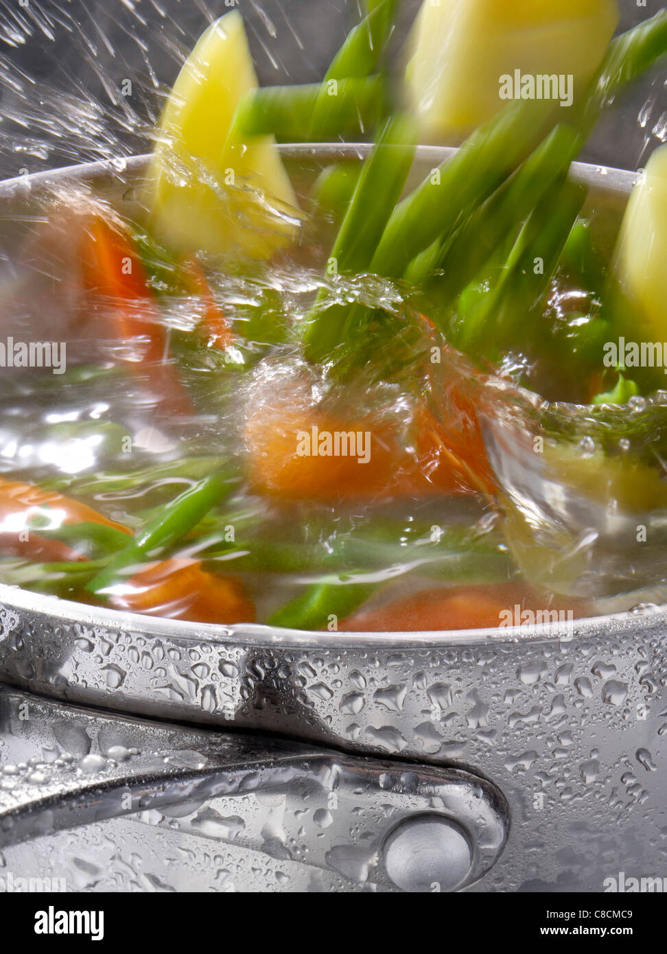 Cooking vegetables in boiling water Stock Photo Alamy