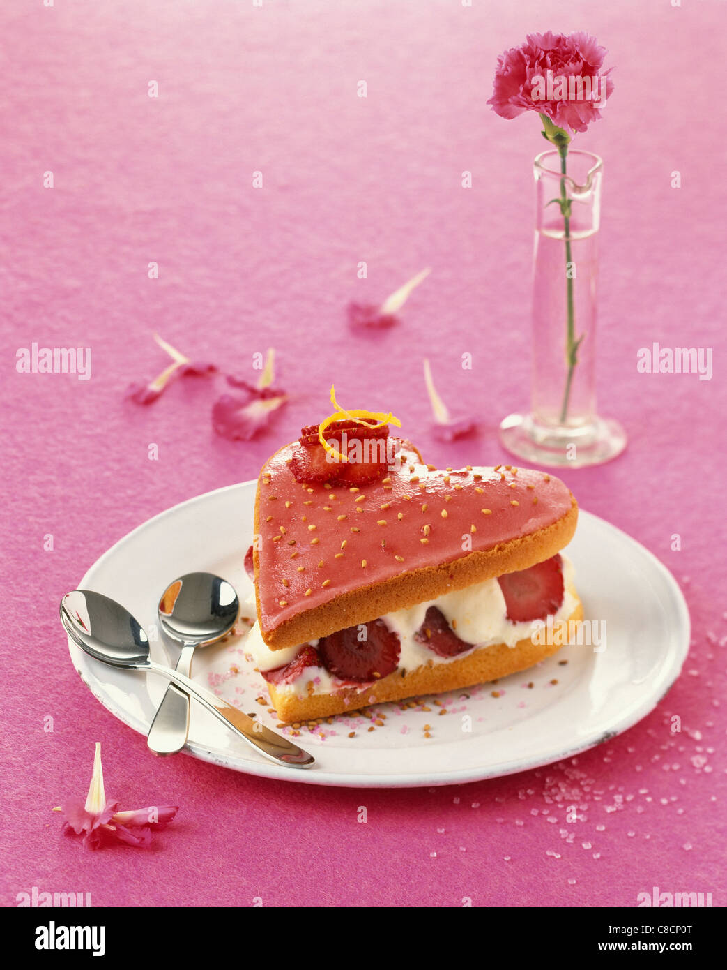 Strawberry and sesame seed heartshaped dessert Stock Photo Alamy