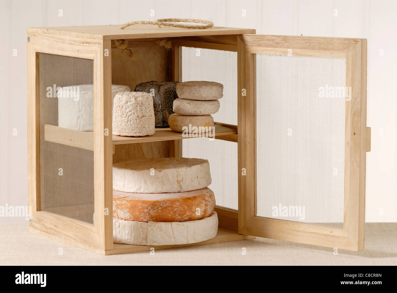 Cheeses in cooler Stock Photo