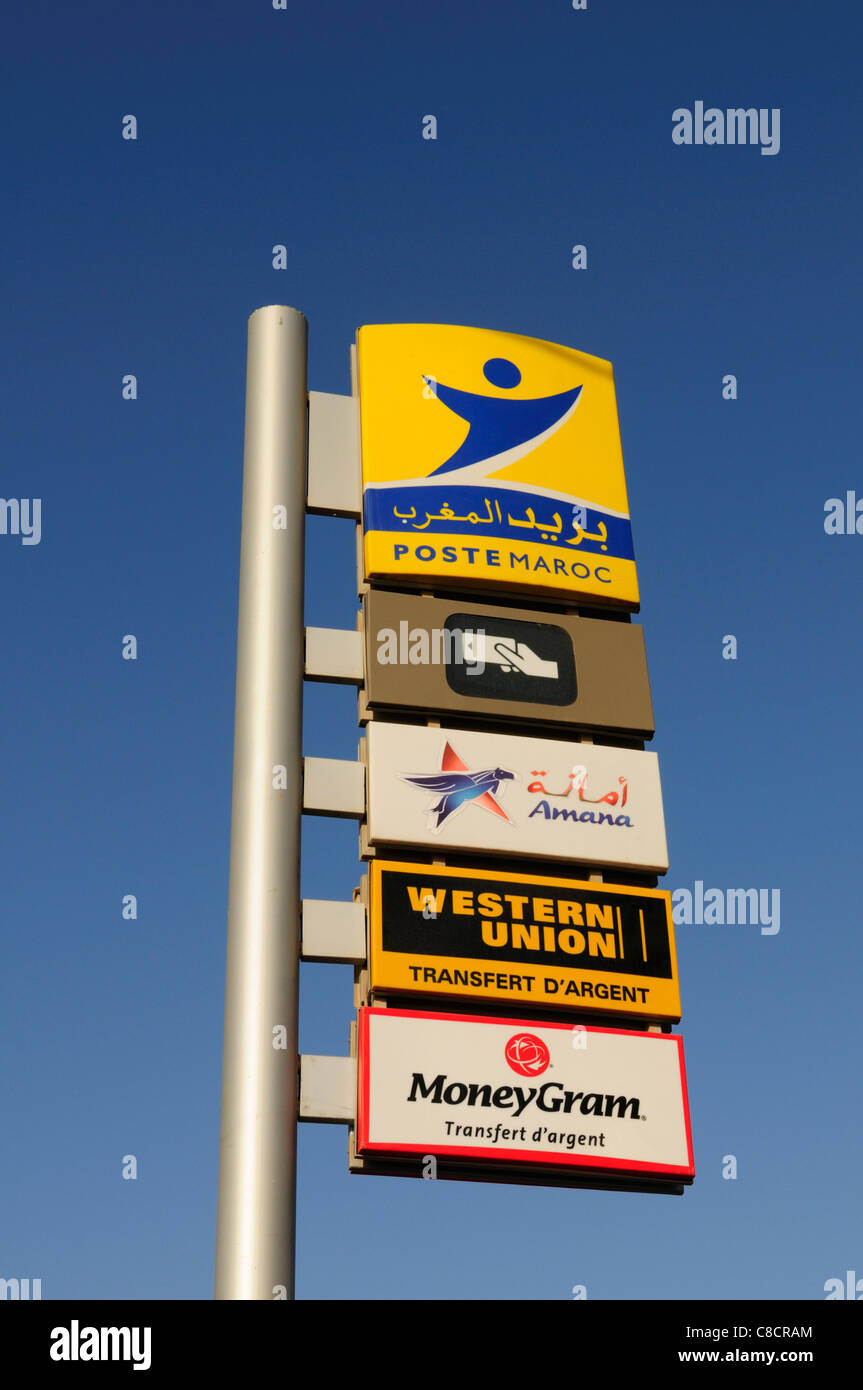 Poste Maroc, ATM, Amana,Western Union and MoneyGram Signs, Tiznit, Morocco Stock Photo