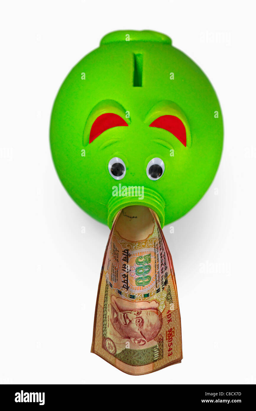 Indian Rupees with a piggy bank, Concept Stock Photo Alamy