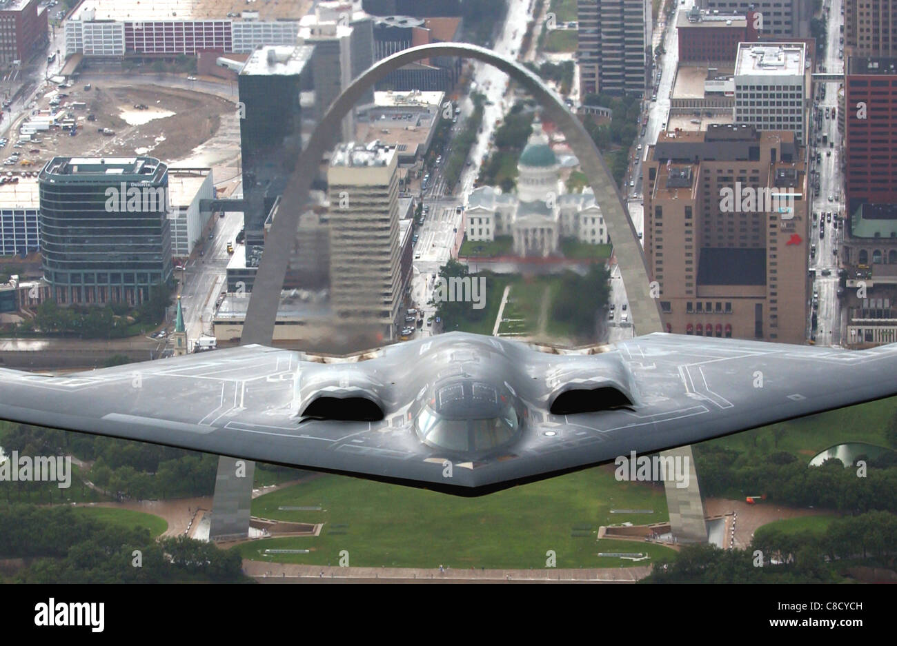 B 2 Spirit Stealth Bomber flying over the St. Louis Arch Stock Photo