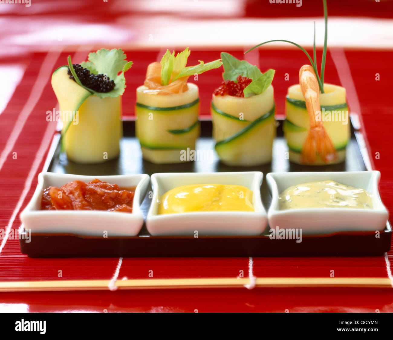 courgette sushi and sauces Stock Photo