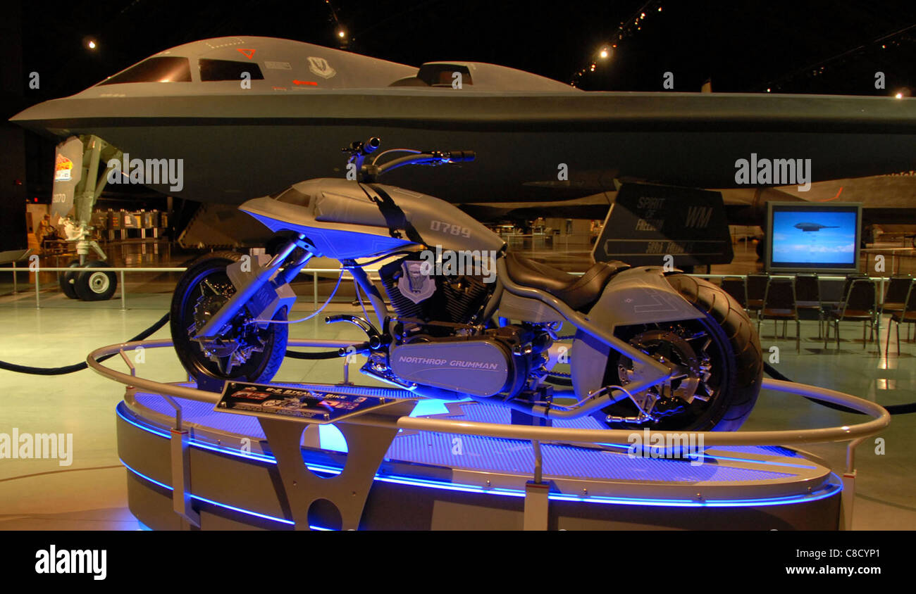 A special B-2 Spirit motorcycle is on display next to the B-2 aircraft ...