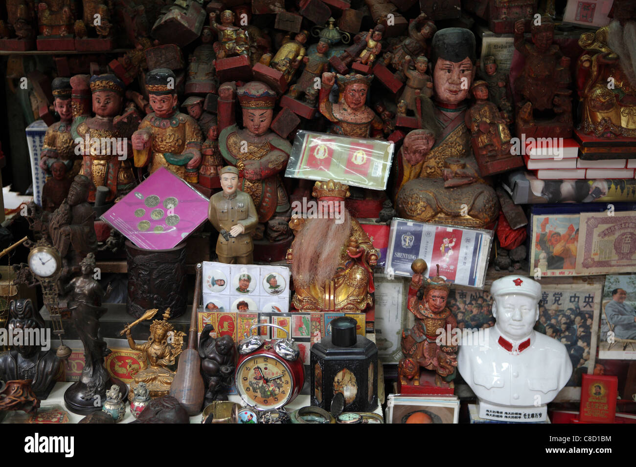 antiques & carved figures for sale street market stall Hong Kong, China, Asia Stock Photo