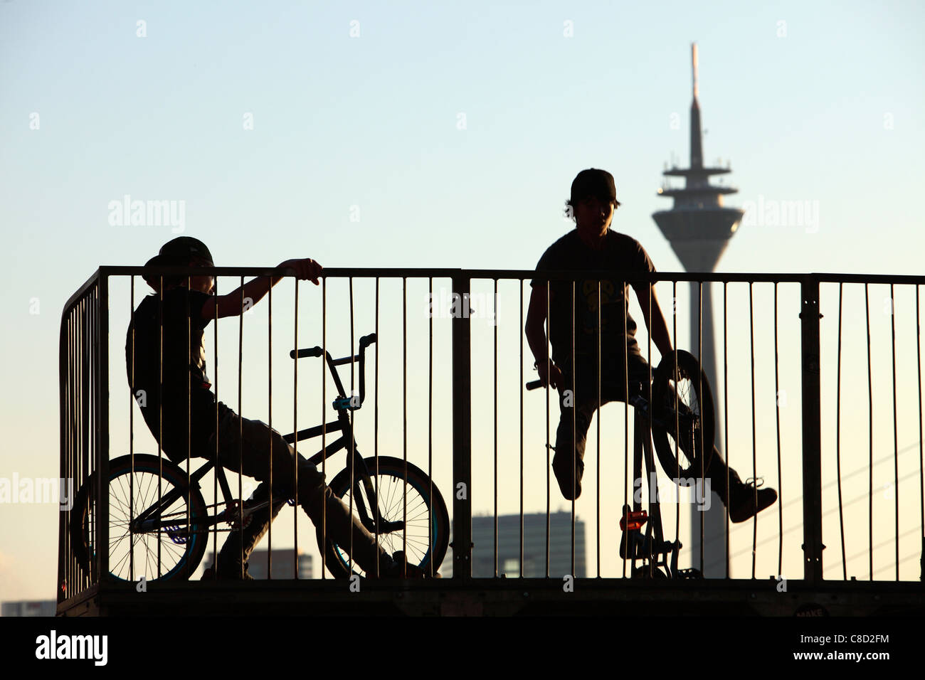 BMX bike half pipe at the riverbanks of river Rhine, TV Tower