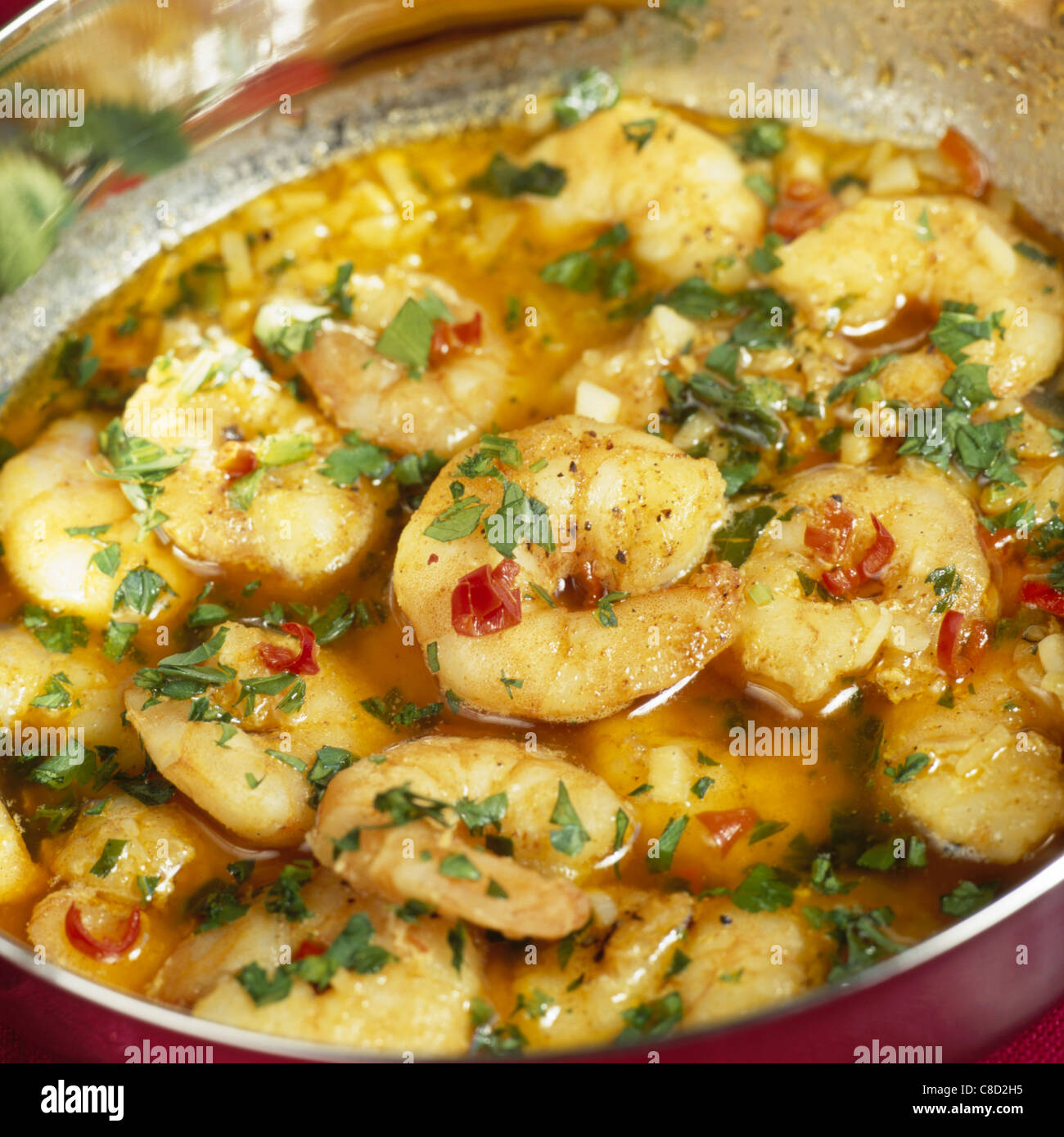 Bowl of chilli garlic king prawns Stock Photo Alamy