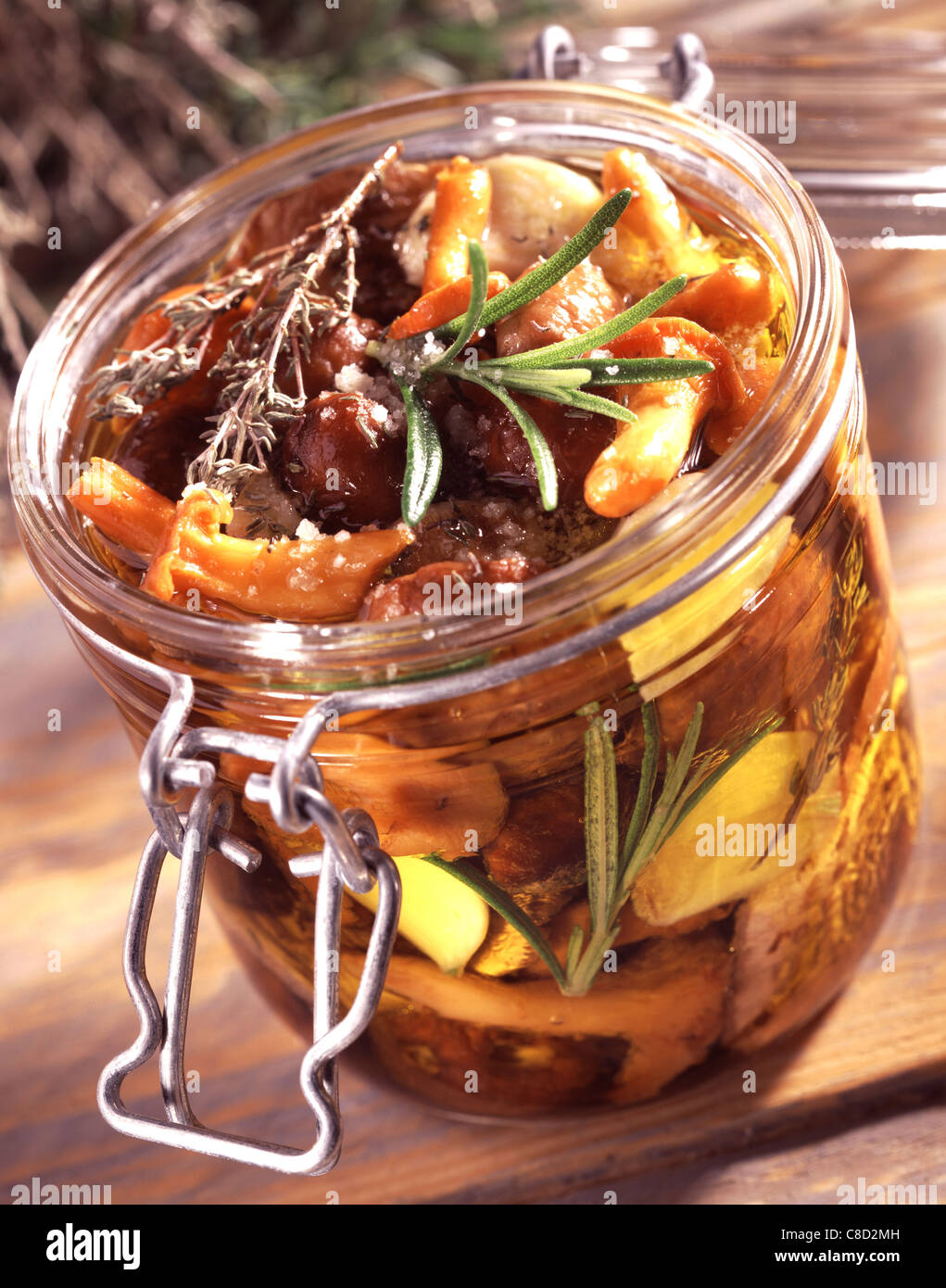 Jar of preserved wild mushrooms Stock Photo Alamy