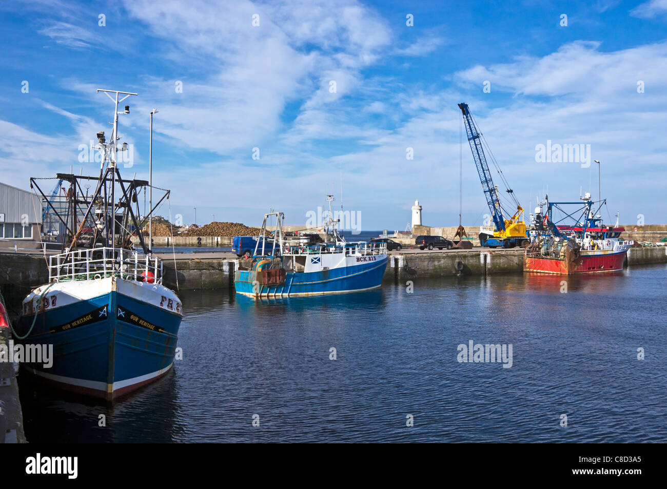 Fishing boats moored in Buckie Harbour in Moray North East Scotland Stock Photo