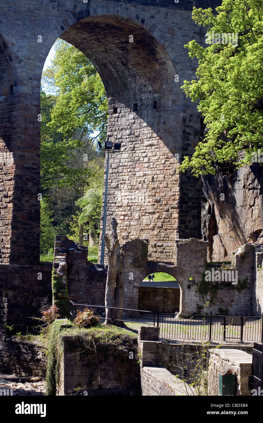 Historic remains of mills and road viaduct at The Torrs New Mills Derbyshire England Stock Photo
