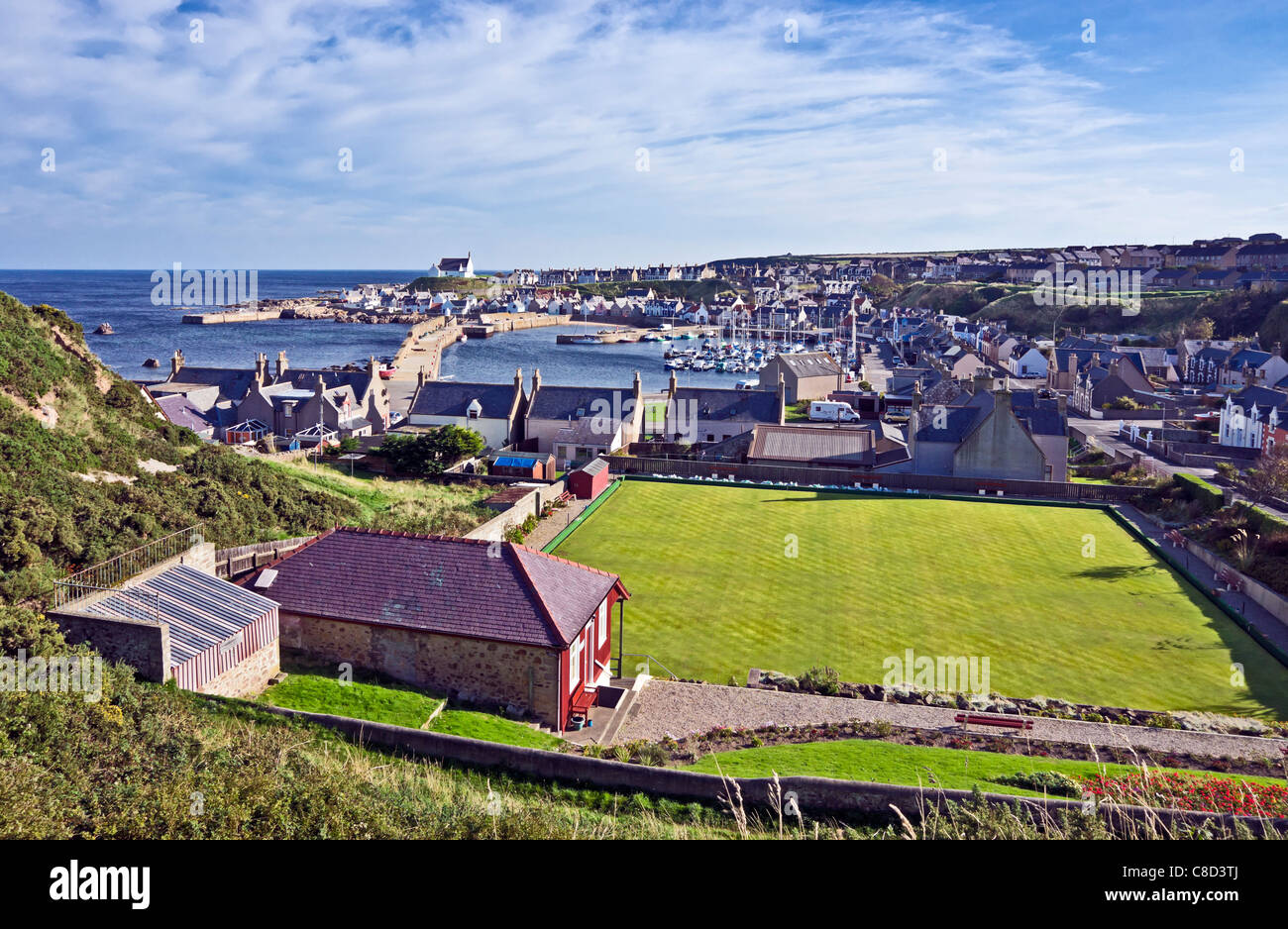 Findochty harbour in Moray North East Scotland with bowling green at the front Stock Photo