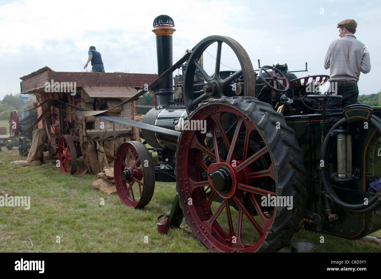 Traction engine powering thresher Stock Photo