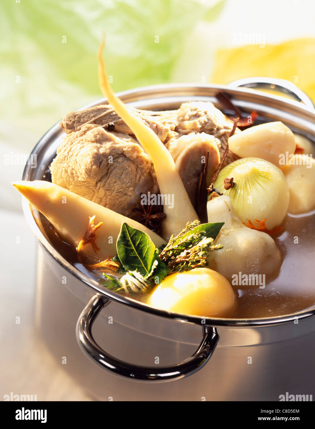 Knuckle of veal with root vegetables Stock Photo Alamy