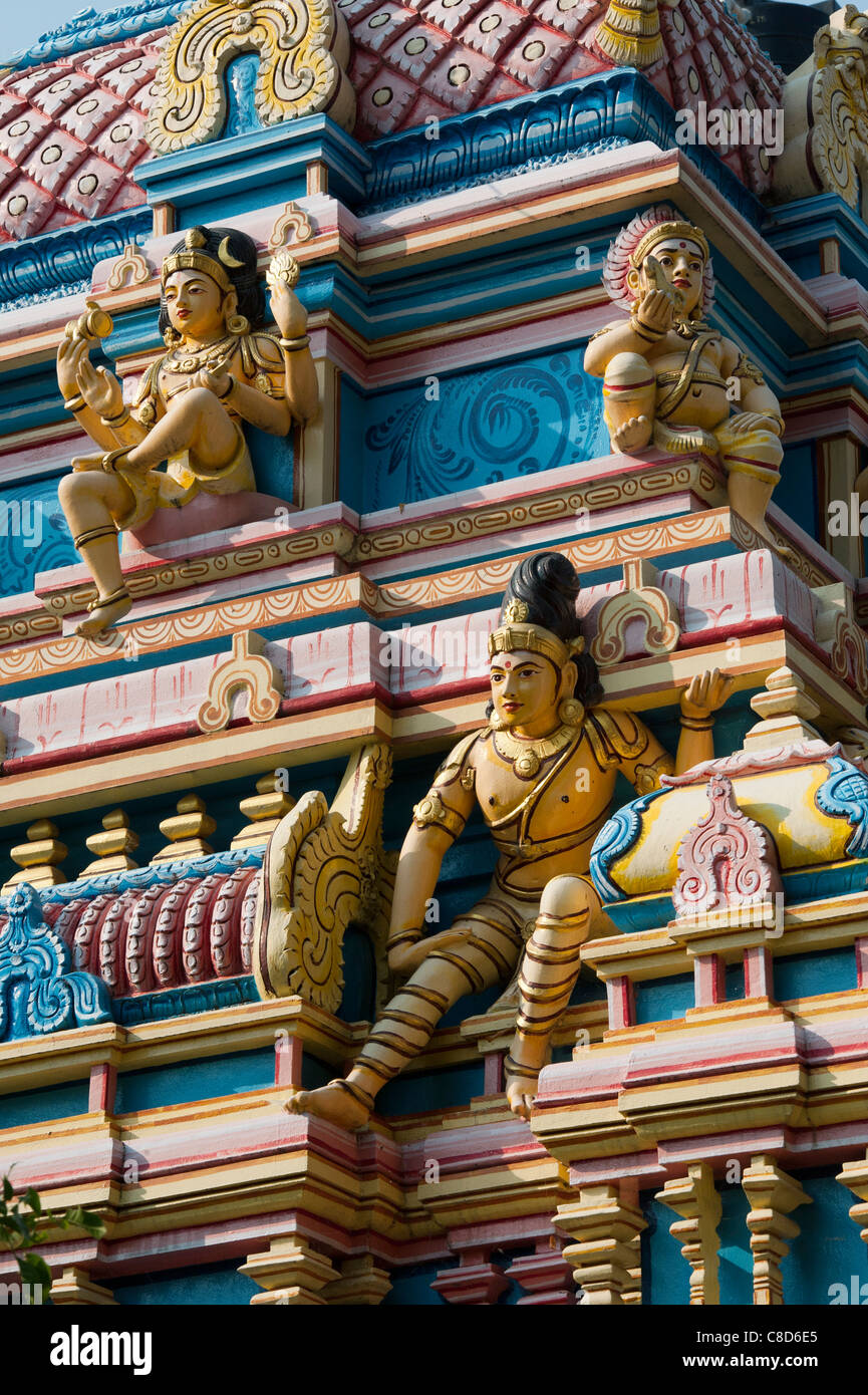 Indian Deities on a Colourful Hindu temple. Puttaparthi, Andhra Pradesh, India Stock Photo