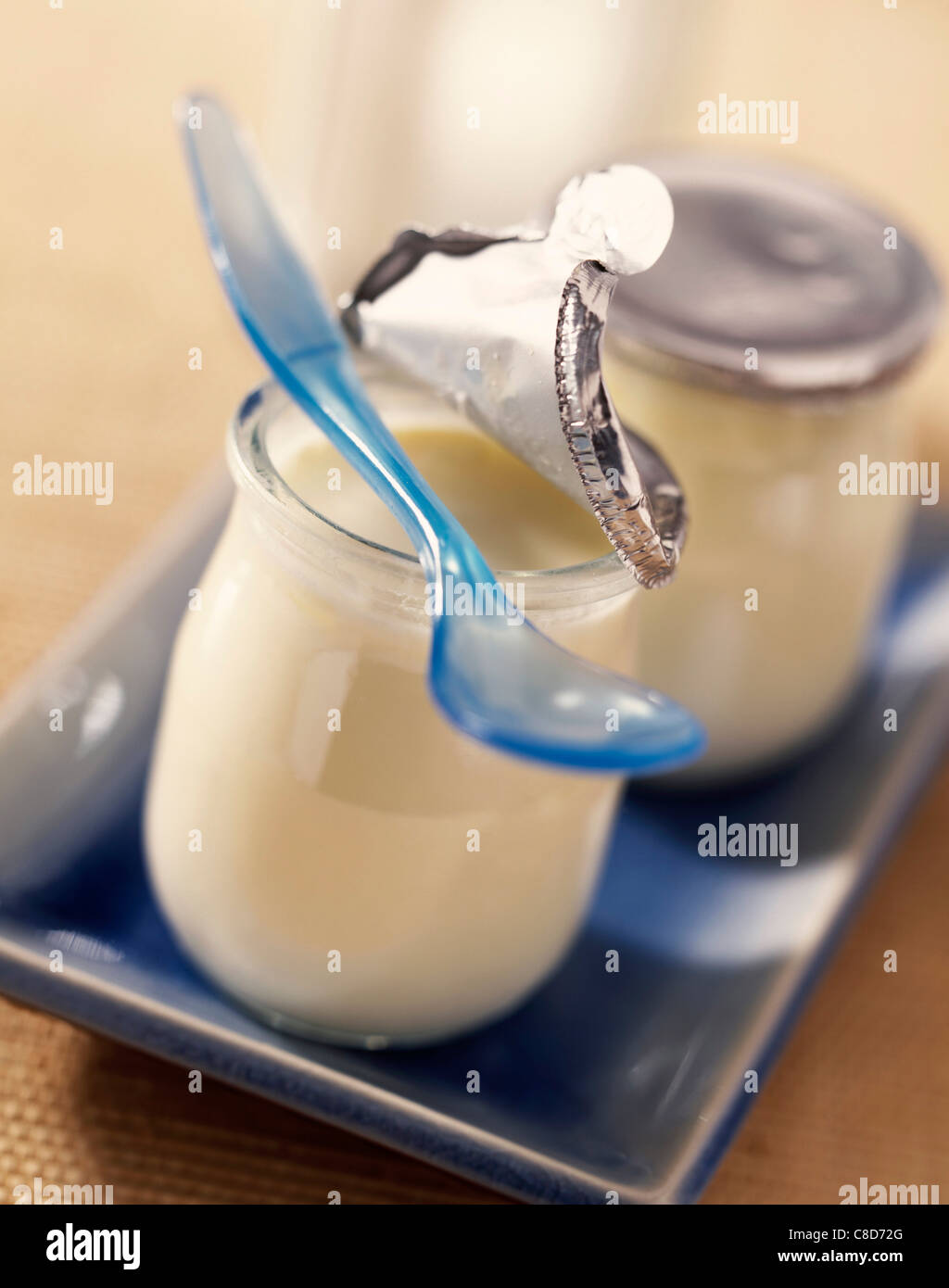 Pots of plain yoghurt Stock Photo