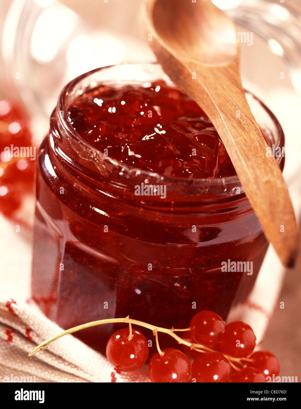 pot-of-redcurrant-jelly-with-wooden-spoon-stock-photo-alamy