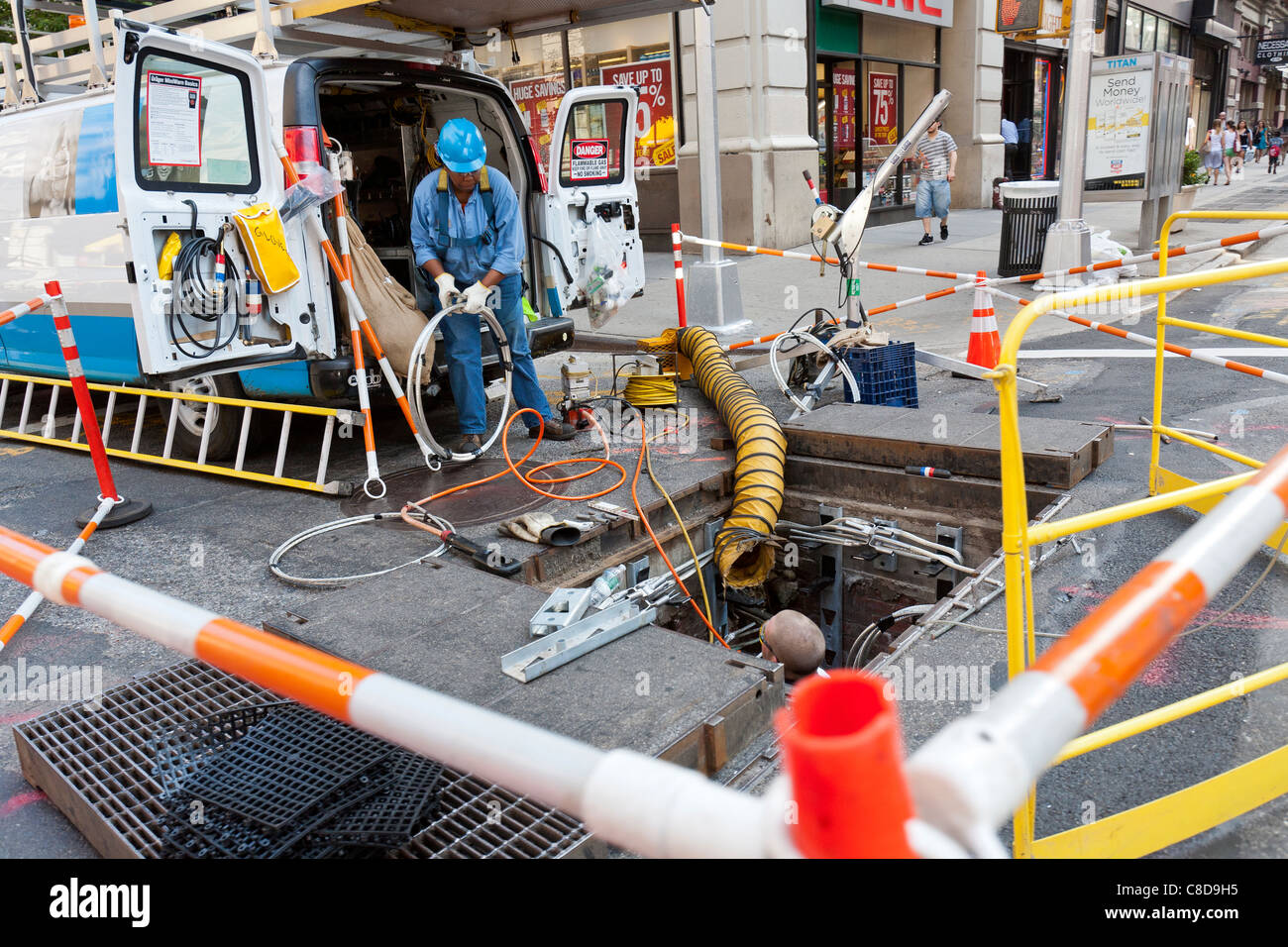 Public Utility Electrical Workers working and making repairs to