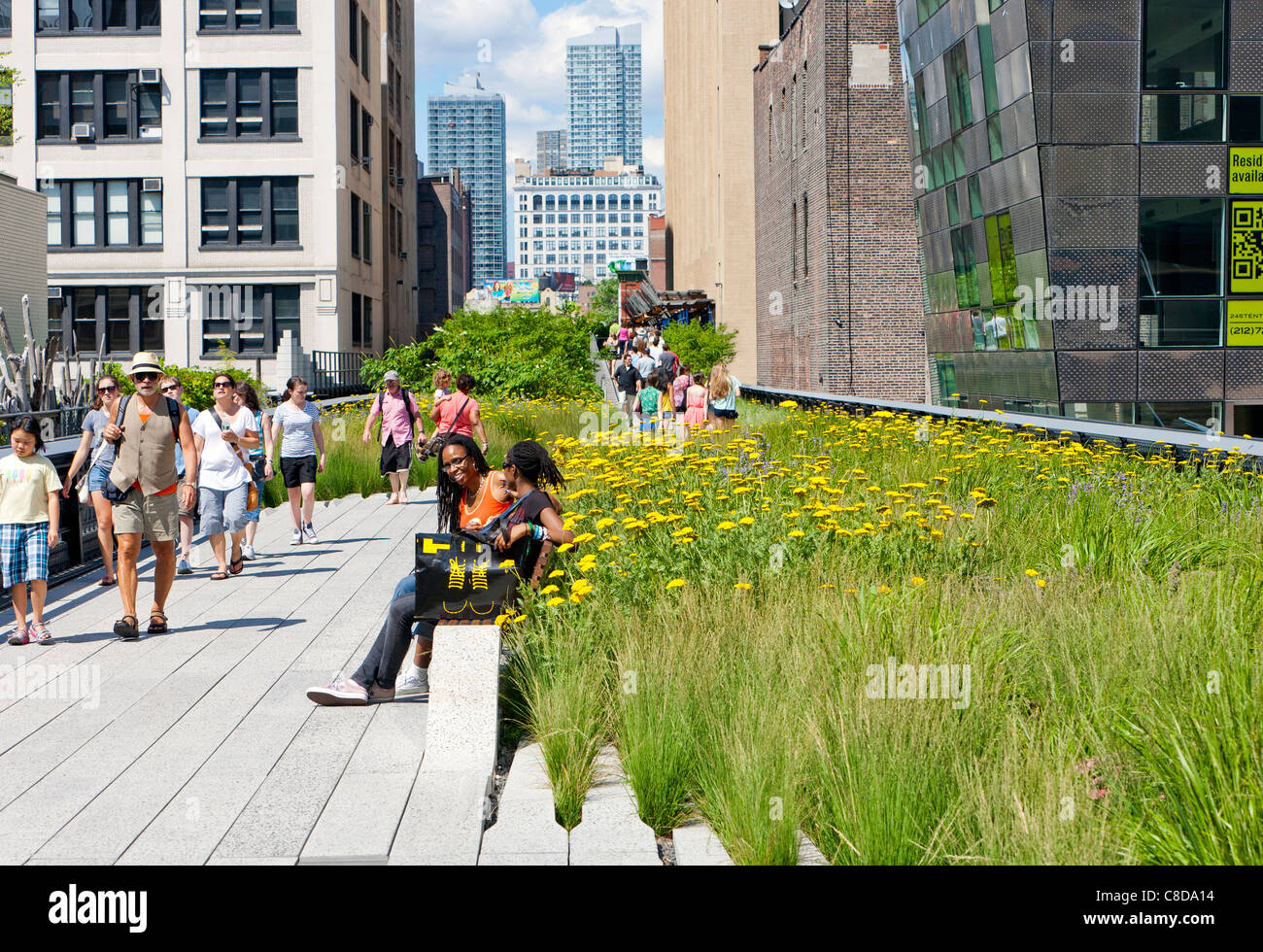 People walking and enjoying The New York City High Line Park Stock ...