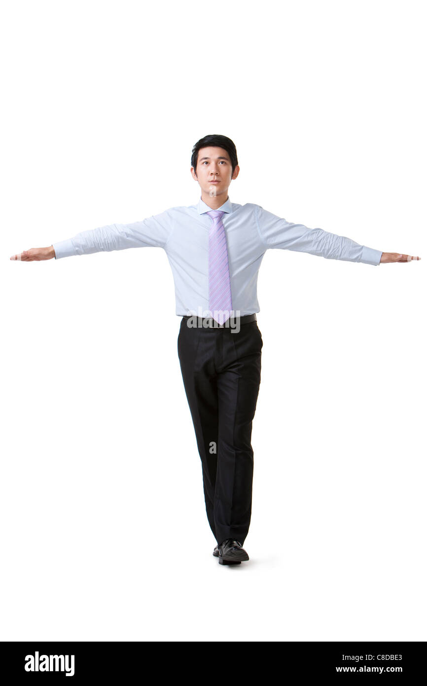 Businessman Walking in a Straight Line, Balanced Stock Photo