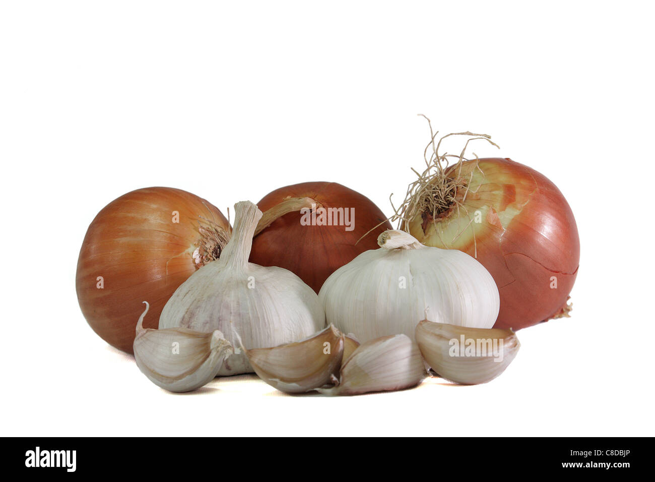 Set onions and garlic on a white background Stock Photo - Alamy
