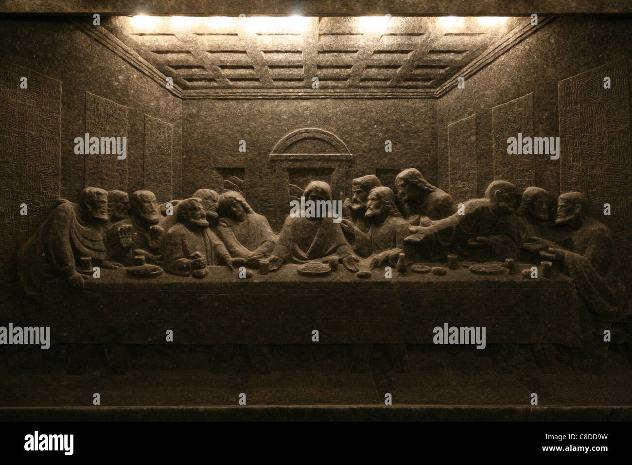 Last Supper. A relief carved in rock salt in the Saint Kinga’s Chamber in the Wieliczka Salt Mine near Krakow, Poland. Stock Photo