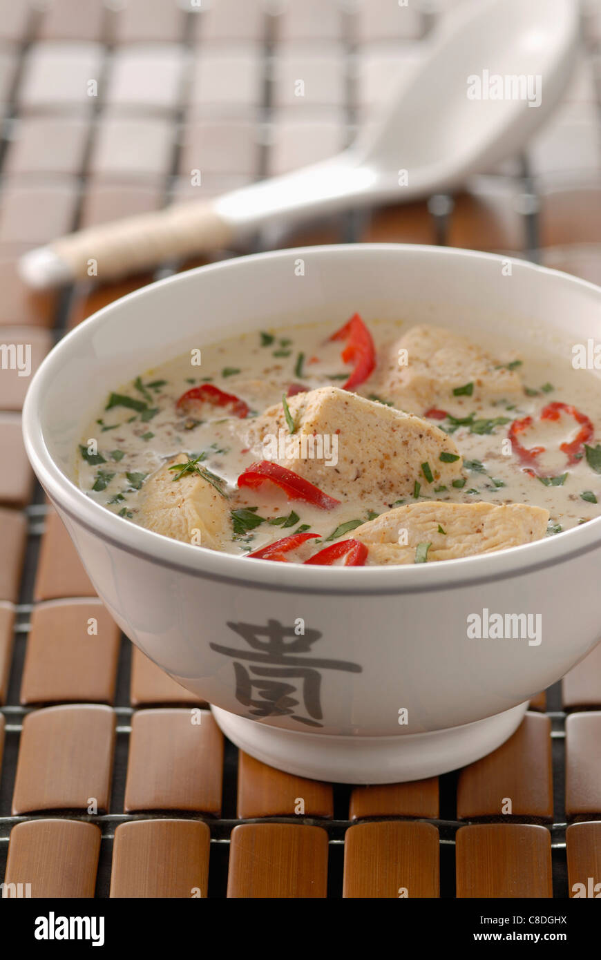 Chicken and coconut milk Thai soup Stock Photo