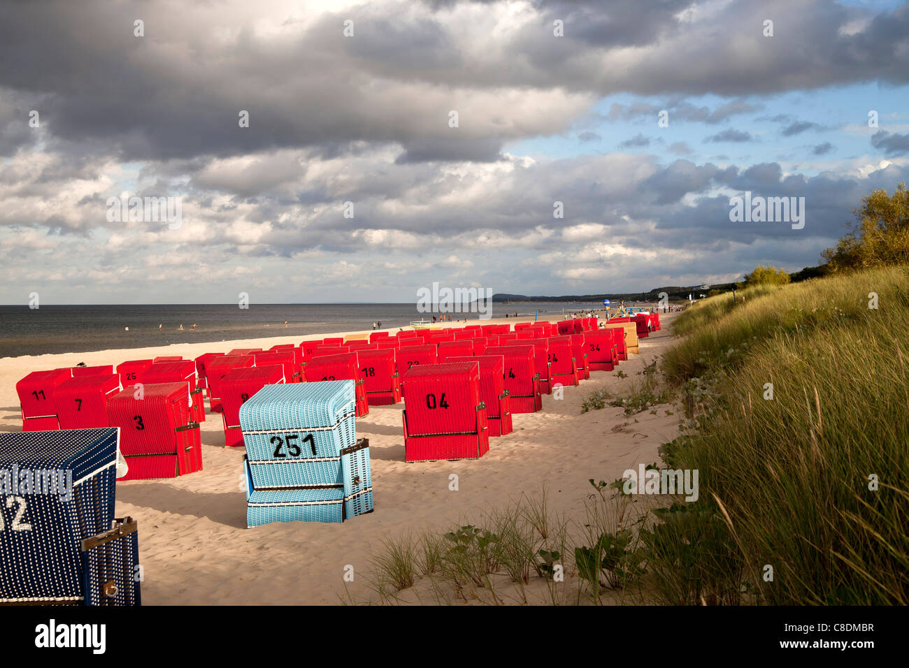 Beach chairs ' Strandkorb ' and the baltic beach of the seaside resort Trassenheide, Usedom island,  Germany Stock Photo