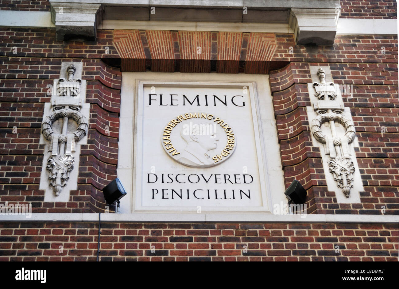 Stone plaque commemorating the discovery of penicillin by Sir Alexander Fleming, St Mary’s Hospital, London, England Stock Photo
