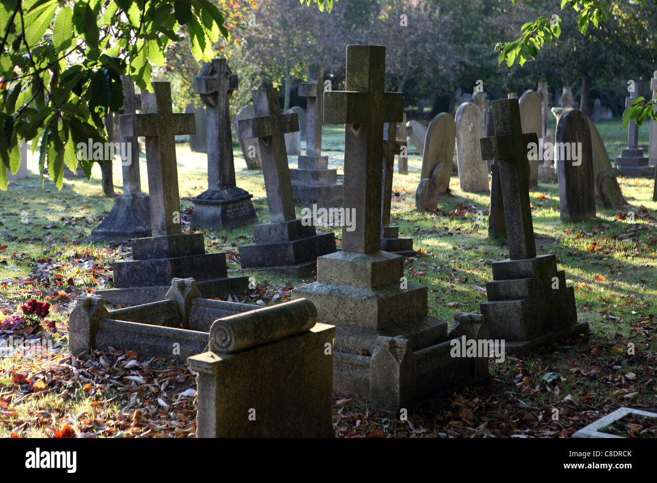 stone crosses on grave stones in English Victorian cemetery, Aldeburgh, Suffolk, UK Stock Photo