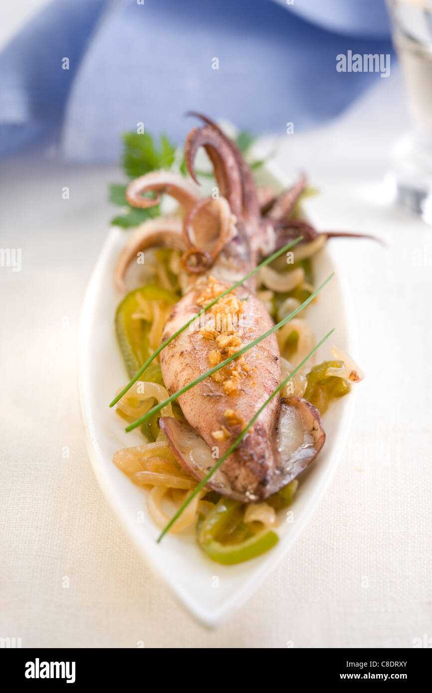 Small casserole dish of squid Stock Photo