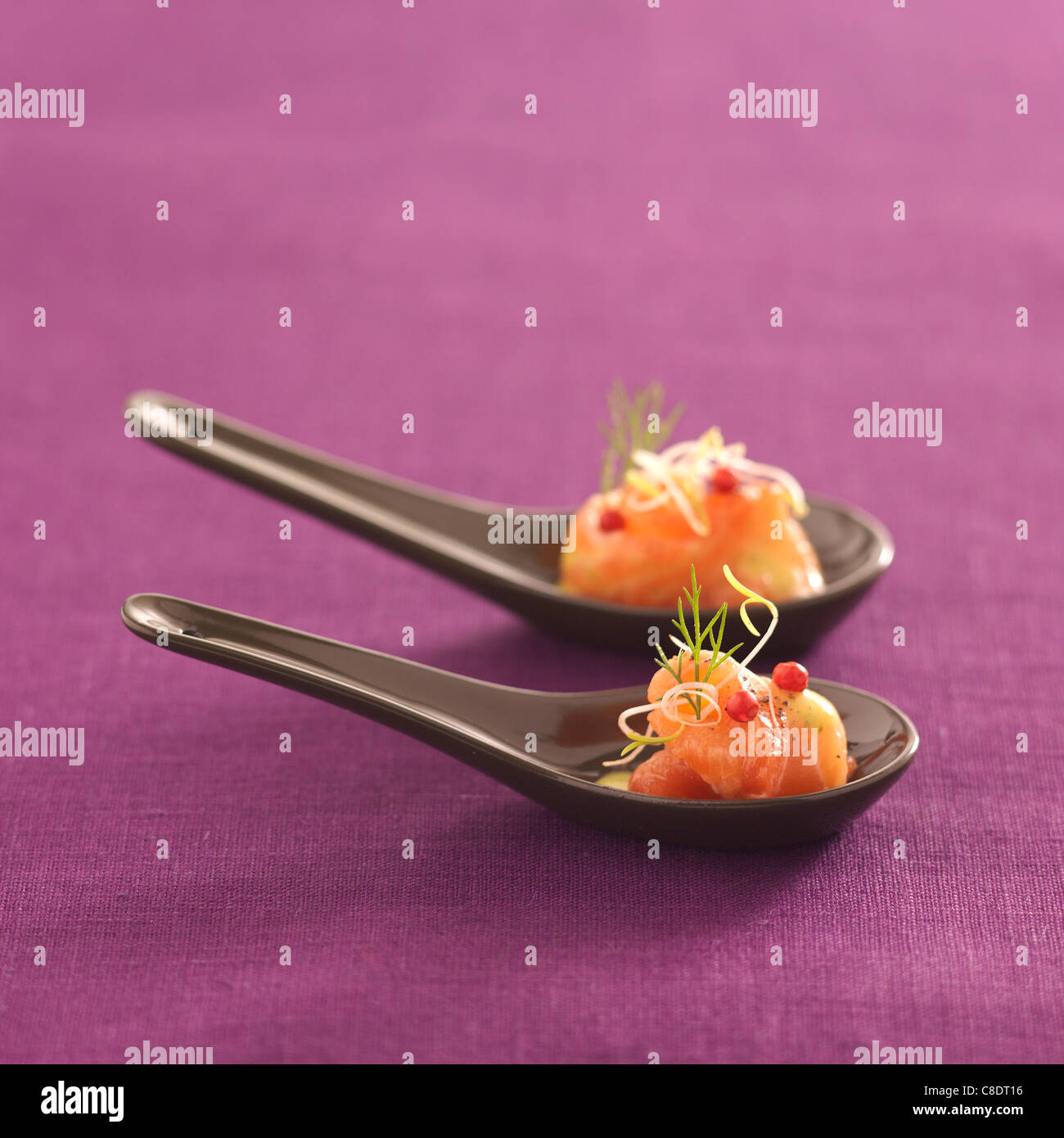 Salmon Carpaccio marinated in orange and mango juice Stock Photo Alamy