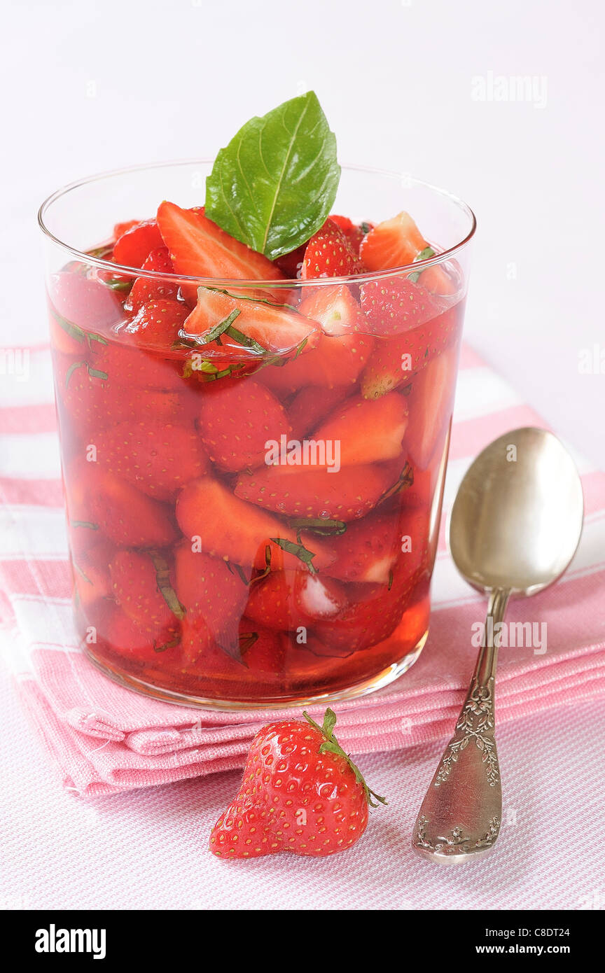 Strawberries in basil sirop Stock Photo Alamy