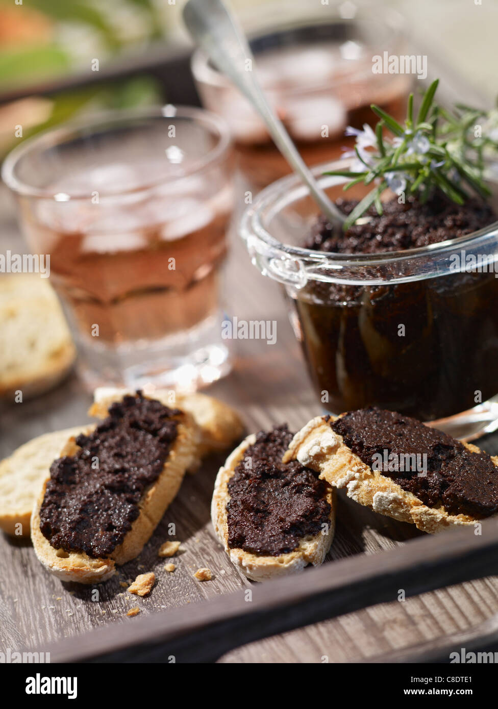 Tapenade on sliced bread Stock Photo Alamy